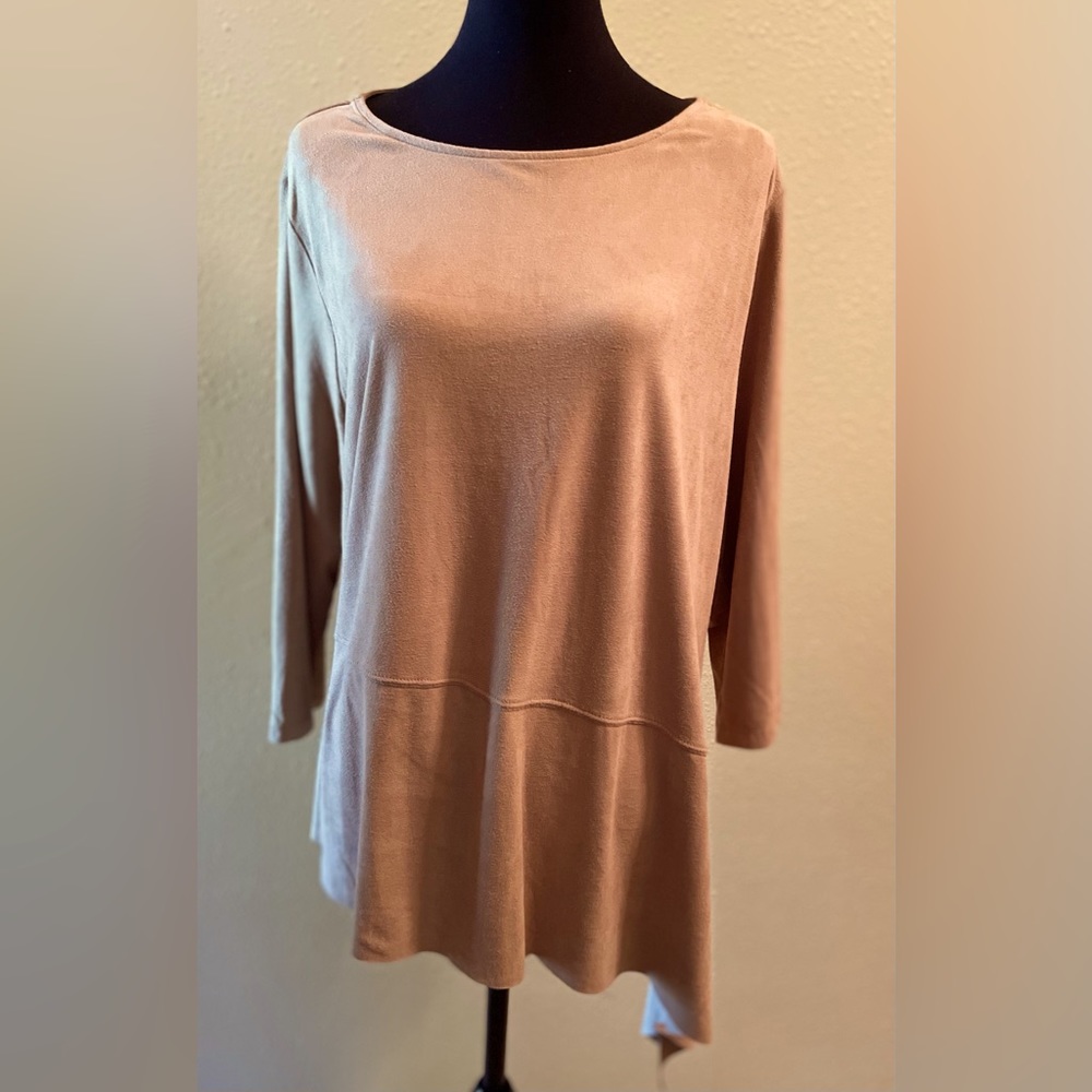 Beautiful faux suede top. Asymmetrical hem line.